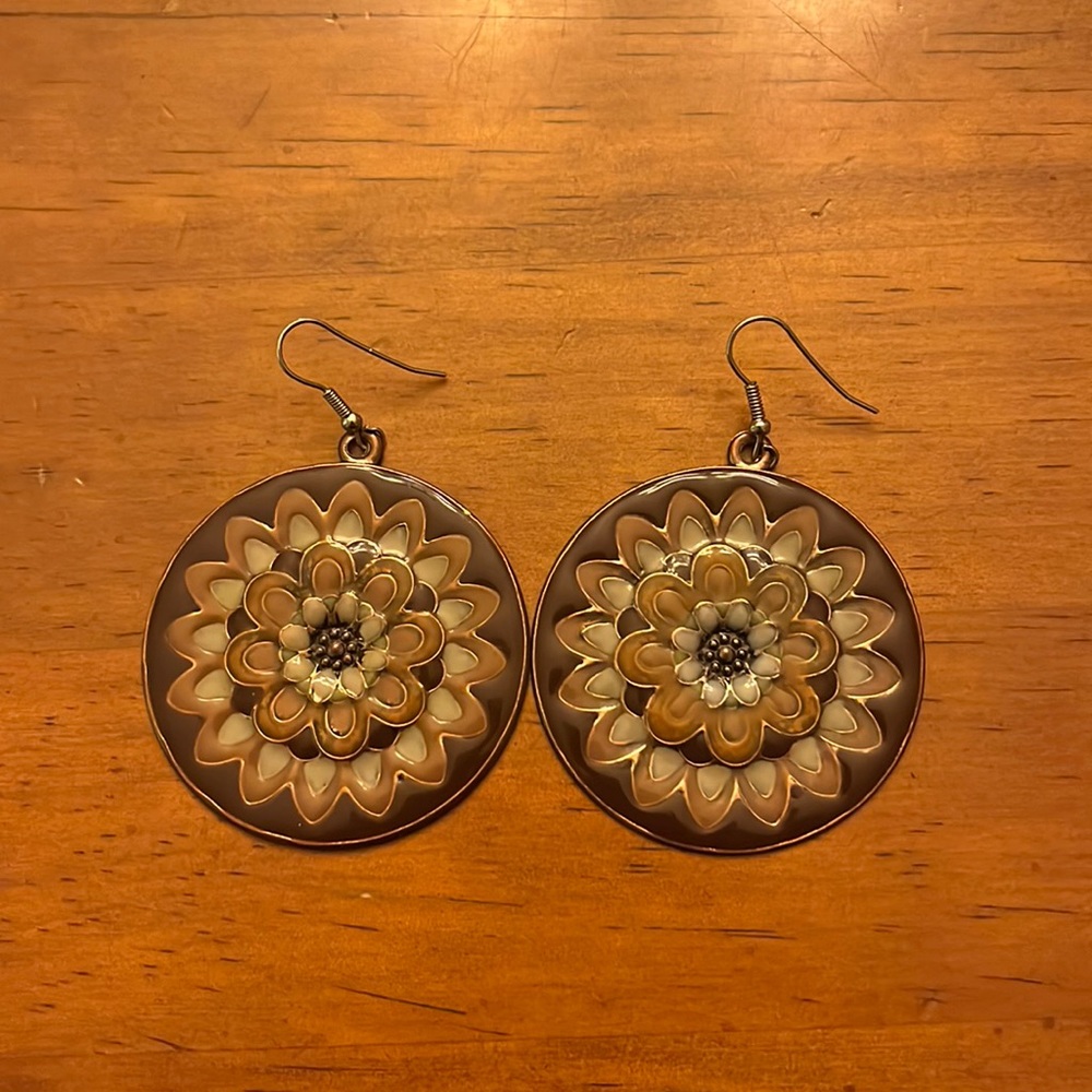 Brown, tan and blue flower pattern earrings.